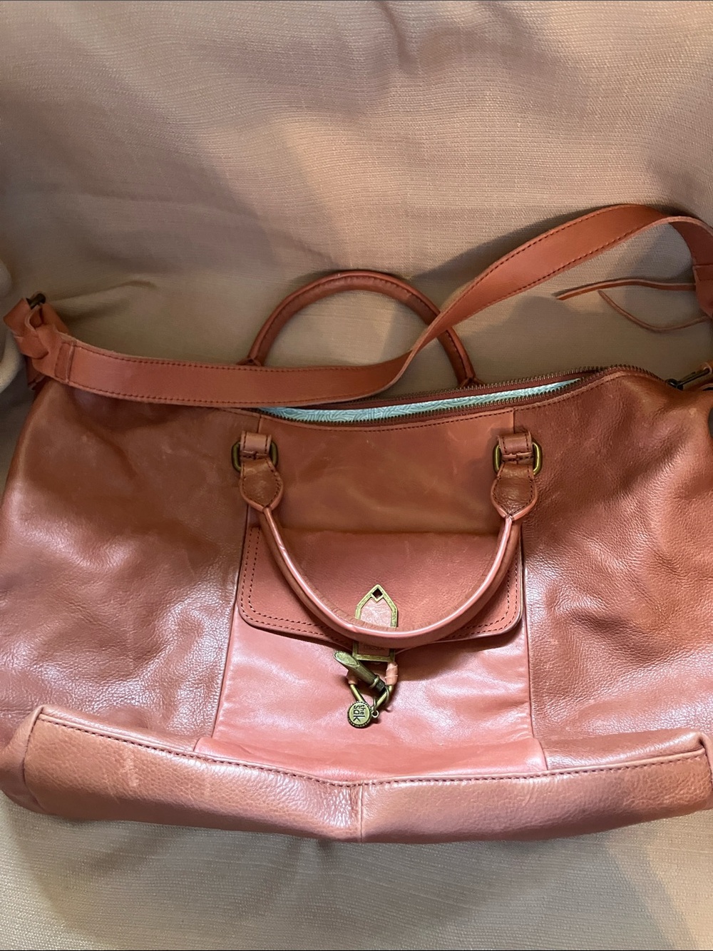The Sak Brick Orange Leather Tote with Front Flap and Charm